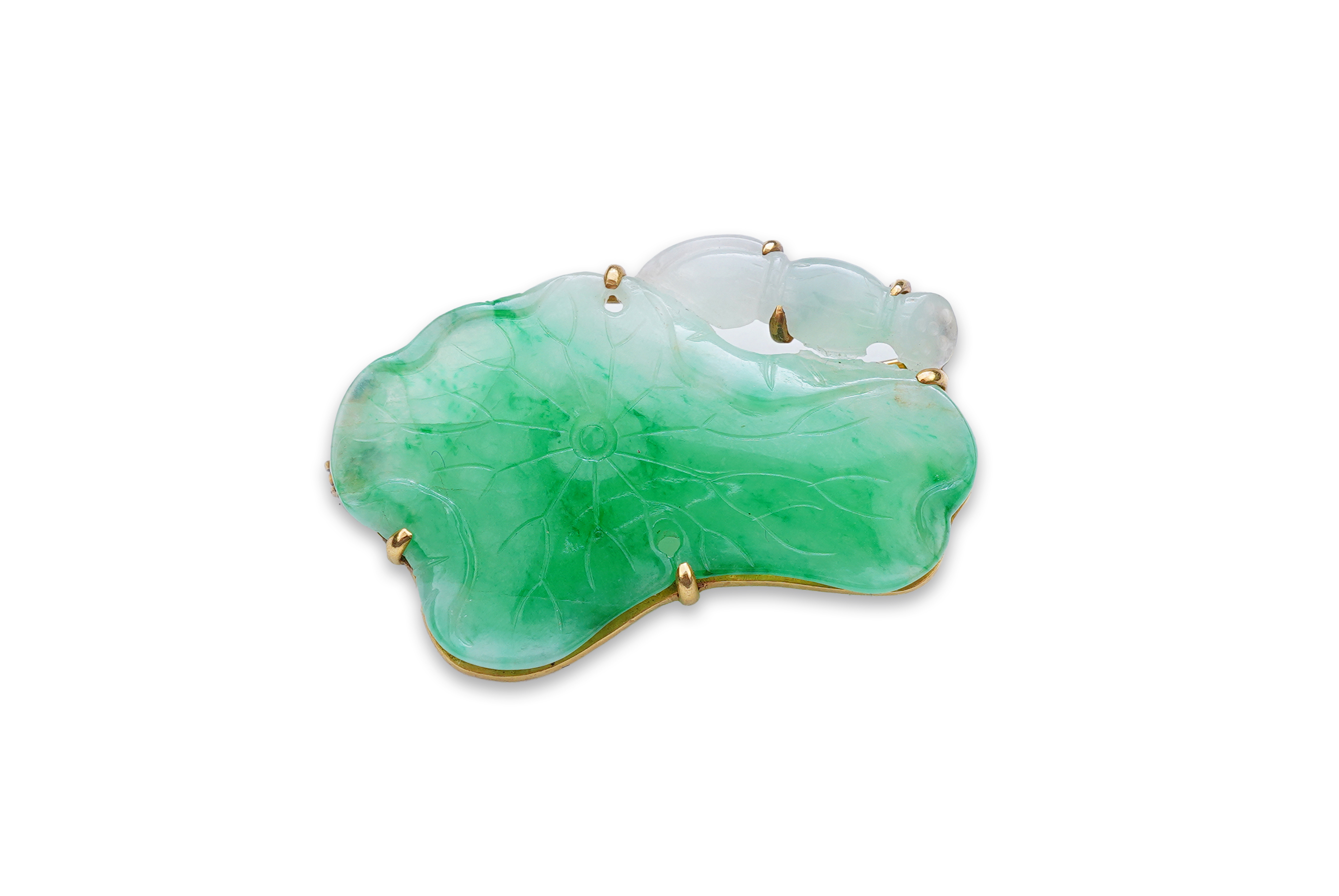 A gold and jadeite brooch